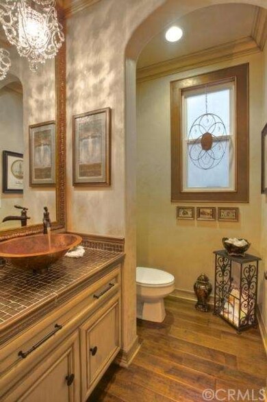 Half Bath with Custom Sink, Fixtures, and Crown Mo