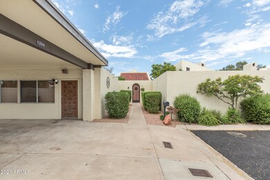 View from carport to front entry