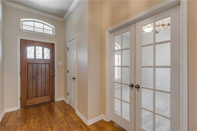 Entrance foyer with ornamental molding, french do