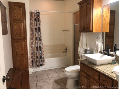 Master bath has tub and separate shower.   Vanity