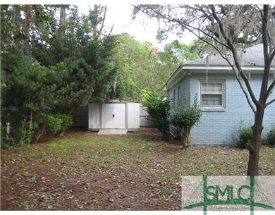 Exterior Back. Extra storage shed