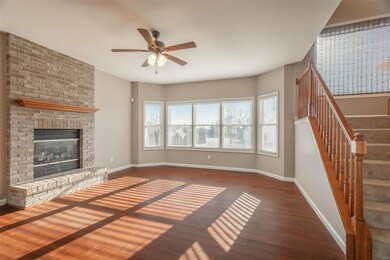 Large family room with brick fireplace