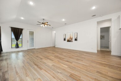 Step into the house you will be welcomed by a spacious living room.