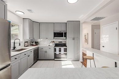 Updated, eat-in kitchen with new refrigerator.