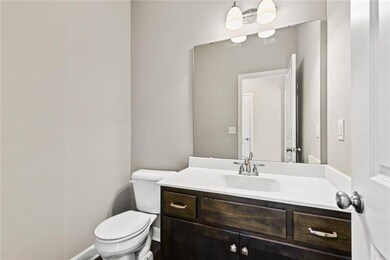 HALF BATH OFF KITCHEN/LIVING AREA
