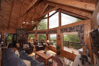 TIMBER FRAME FEATURES IN CEILING.