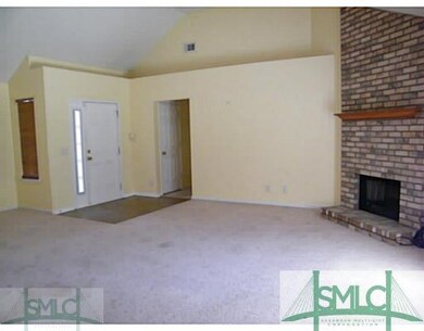 Den/Family/Great Room. High Ceilings w/ brick fire