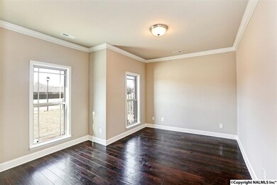 This oversized study has rich hardwood floors, natural light, and plenty of space.