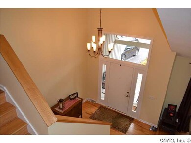 Foyer. A grand main entrance to the home is enhanc