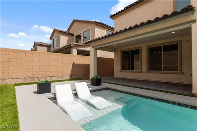 View of pool featuring fence and a patio area