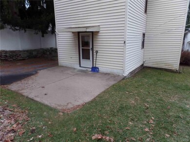 Great concrete patio in rear kitchen entry door