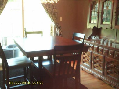 Dining Room. Doors lead to back patio and back yar