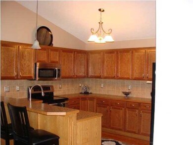 Kitchen has plenty of room to work with an eating 