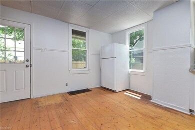 Third view of kitchen. Spacious area leading out t