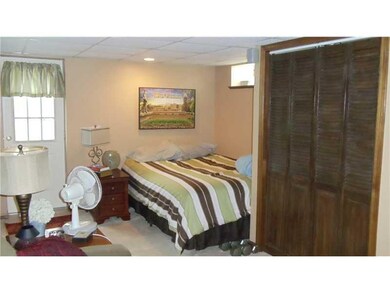 Family Room. Finished basement currently used as 4