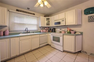 FULLY EQUIPPED KITCHEN WITH PLENTY OF COUNTER SPAC