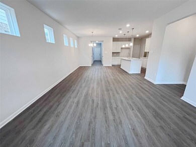 The Robin II- Family Room into Dining. Home under
