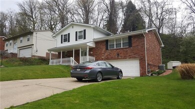 Exterior front showing two car garage. Double wide