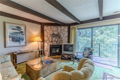 92 Water's Edge Ct unit 15-3B, Village of Four Seasons, MO 65049 - photo 2