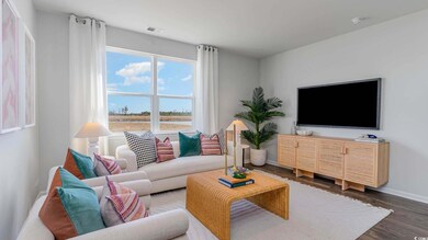 Living room with dark wood-type flooring