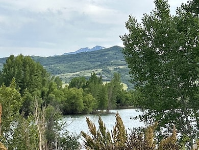 Mountain view featuring a large body of water