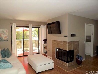 Cozy corner gas fireplace visible from Living and 