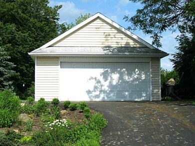 Exterior Back. Newer 2nd 2 car garage with an uppe