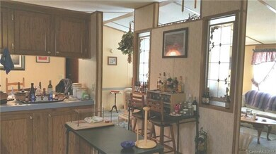Lots of light, open to dining & living room
