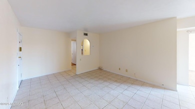 1600-n-wilmot-rd-unit-106-living-room1