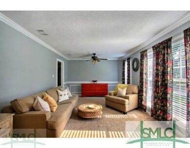 Living Room. Living Room is bright and has a ceili
