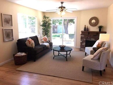 Sliding glass doors to the huge back yard bring th