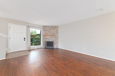 The open layout creates a warm and inviting space,