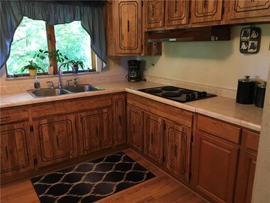 KITCHEN WITH HARDWOOD FLOOR