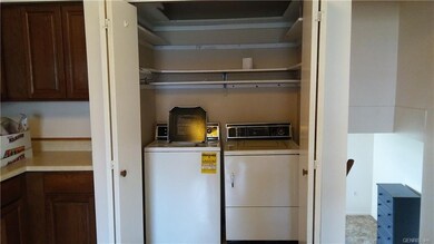 Washer and dryer in unit. and lots of shelving!