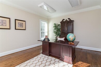 Spacious, bright office off of foyer