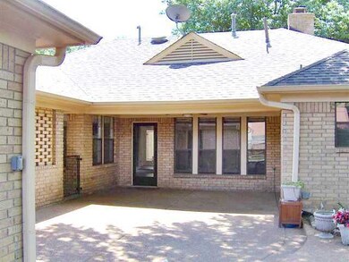 Covered Patio (with a fan) and plenty of open spac