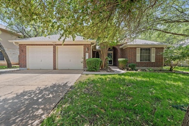 Ranch-style home featuring an attached garage, dr