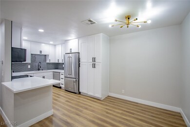 Kitchen featuring stainless steel appliances, visi