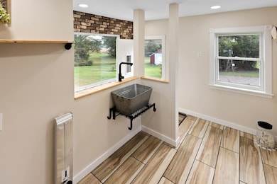 Beautiful tiled floors make this easy to keep clean and looking great year-round.