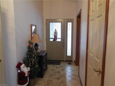 Nice foyer entrance area with ceramic tile floor.