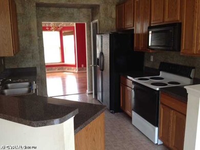 Kitchen - Kitchen w/Range/Microwave and Refrigerat