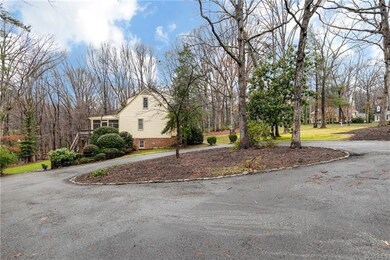 PAVED DRIVEWAY.  16 X 16 DECK.  16 X 26 SCREENED P