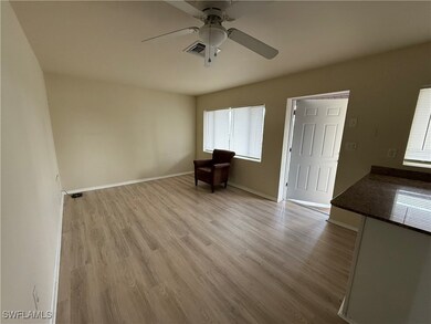 Unfurnished room featuring ceiling fan and light hardwood / wood-style floors