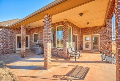 Covered Patio. Perfectly arranged areas for lounging and for grilling too (right outside the kitchen).