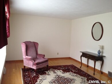 Family Room. The front family room has hardwood fl