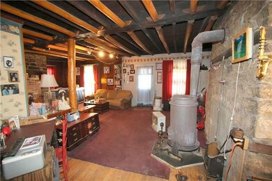 Spacious 15x20 Dining Room w/ Wood Stove opens int