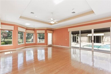Family Room with Court Yard Access and Golf Views