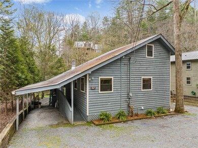Covered porch and carport parking.