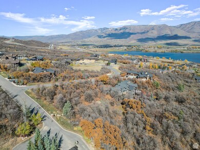 View of property location with a water and mountain view