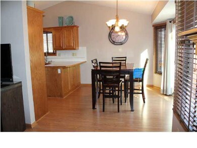 Newer sliding door leads out the great back yard.